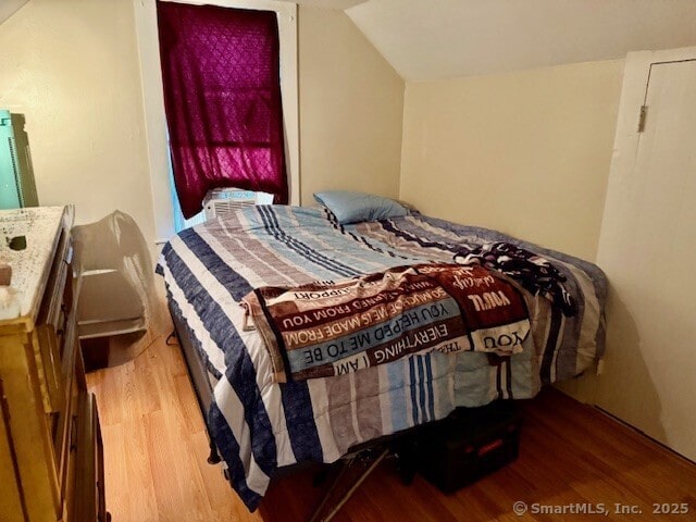 72 Stewart St, Bristol, CT 06010 - bedroom featuring wood finished floors and lofted ceiling