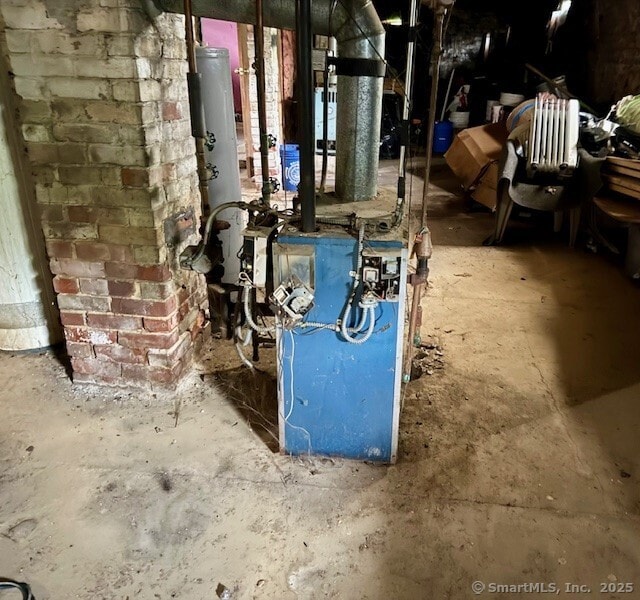 72 Stewart St, Bristol, CT 06010 - utility room with gas water heater and a heating unit