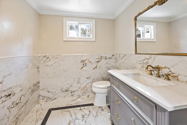 90 Haddad Rd, Waterbury, CT 06708 - bathroom with vanity, marble tiled flooring, tile walls, a wainscoted wall, and crown molding