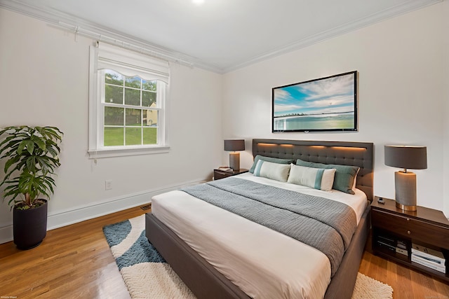 90 Haddad Rd, Waterbury, CT 06708 - bedroom featuring ornamental molding and wood finished floors