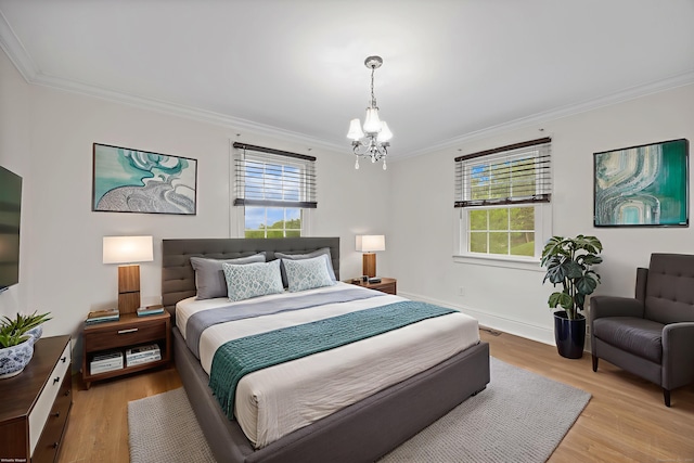 90 Haddad Rd, Waterbury, CT 06708 - bedroom featuring a chandelier, crown molding, and light wood finished floors