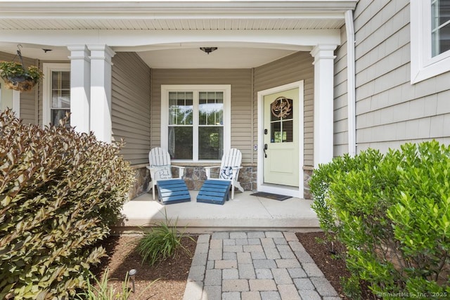 47 Bradford Walk Unit 47, Farmington, CT 06032 - property entrance with a porch and stone siding