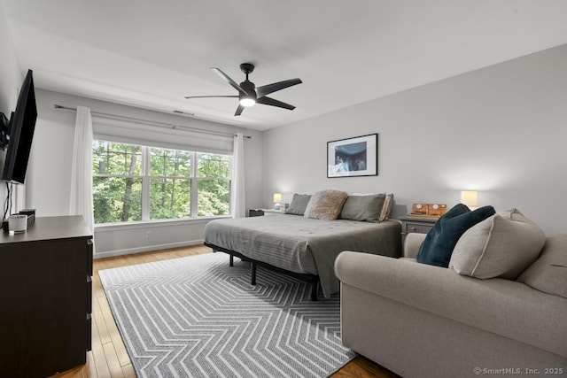 47 Bradford Walk Unit 47, Farmington, CT 06032 - bedroom featuring light wood-type flooring and a ceiling fan
