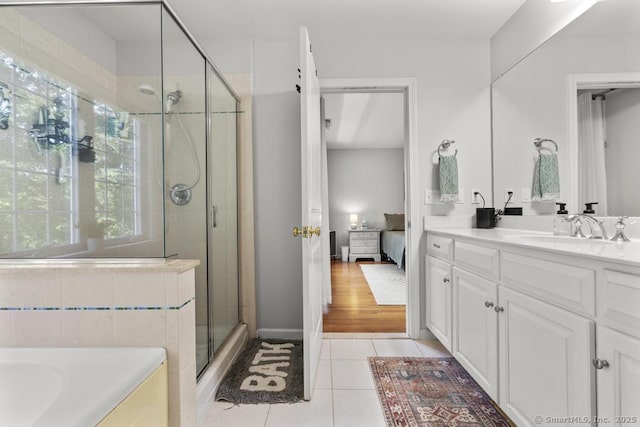 47 Bradford Walk Unit 47, Farmington, CT 06032 - ensuite bathroom featuring plenty of natural light, a shower stall, and vanity
