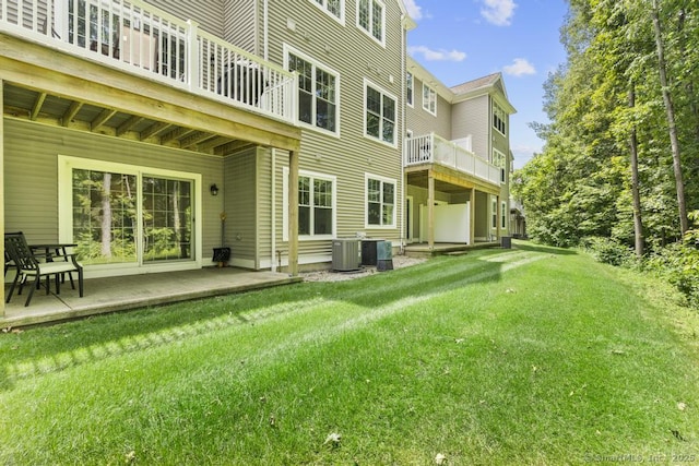 47 Bradford Walk Unit 47, Farmington, CT 06032 - rear view of house with a yard and a patio area