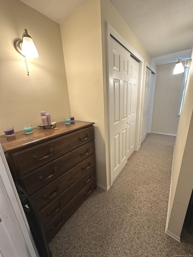 14 Lakeside Dr Unit Q, Ledyard, CT 06339 - hall featuring carpet flooring and a textured ceiling