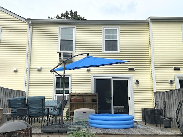 14 Lakeside Dr Unit Q, Ledyard, CT 06339 - back of house featuring a deck and outdoor dining space