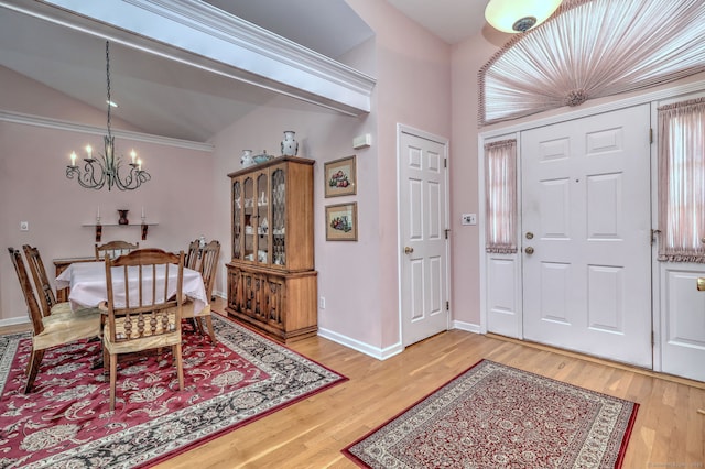507 Elk Run Unit 507, Shelton, CT 06484 - foyer entrance with a chandelier, light wood-type flooring, and lofted ceiling
