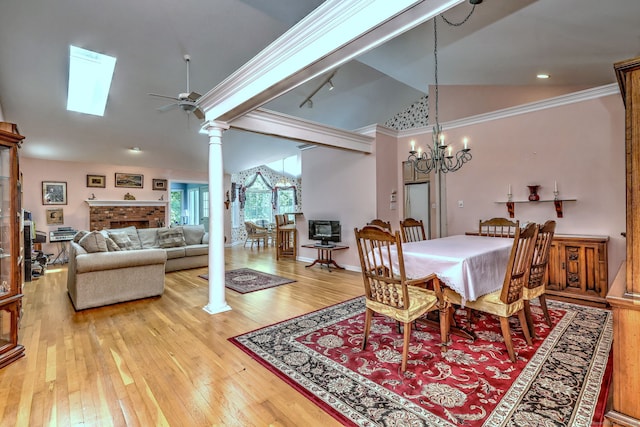507 Elk Run Unit 507, Shelton, CT 06484 - dining space featuring a chandelier, light wood-type flooring, crown molding, ceiling fan, and lofted ceiling