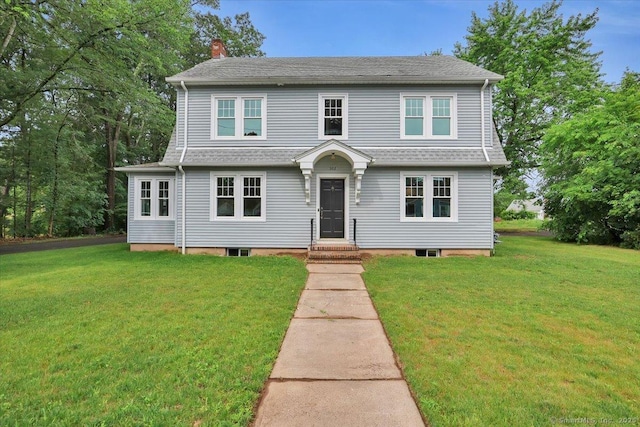 502 Adams St, Manchester, CT 06040 - view of front facade featuring a chimney, a front lawn, and roof with shingles