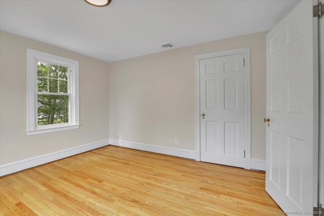 502 Adams St, Manchester, CT 06040 - spare room featuring light wood-style flooring and baseboards