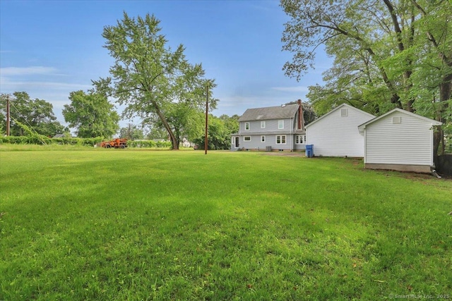 502 Adams St, Manchester, CT 06040 - view of green lawn featuring a storage unit