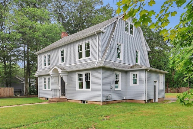 502 Adams St, Manchester, CT 06040 - dutch colonial featuring a gambrel roof, a chimney, and a shingled roof