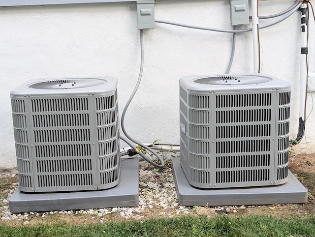 18 Victory St, Bridgeport, CT 06606 - exterior view of a cooling unit and stucco siding