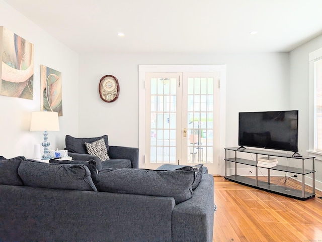 18 Victory St, Bridgeport, CT 06606 - living area featuring french doors, light wood-style flooring, and recessed lighting