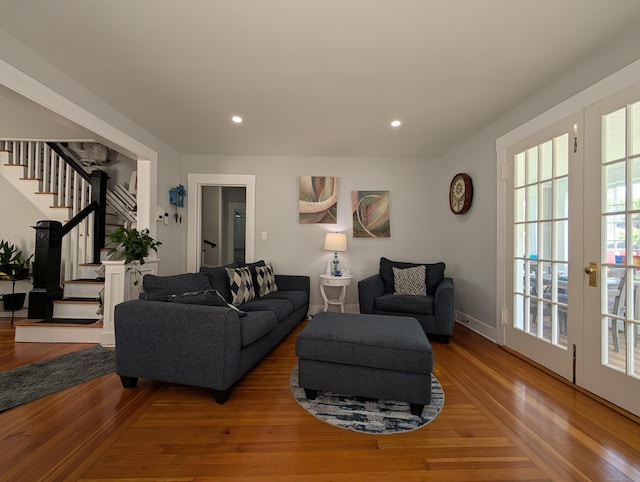 18 Victory St, Bridgeport, CT 06606 - living area featuring stairs, wood finished floors, and recessed lighting