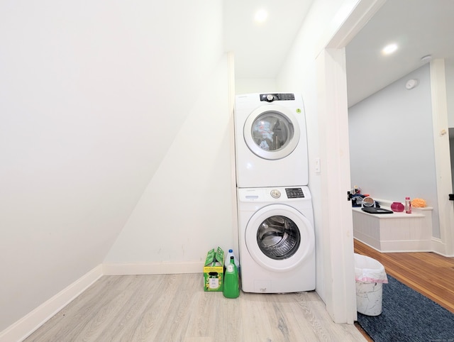 18 Victory St, Bridgeport, CT 06606 - laundry area featuring stacked washer and clothes dryer, wood finished floors, and recessed lighting