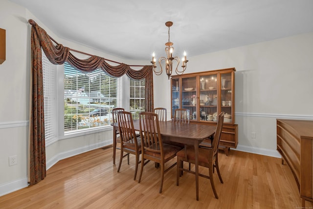 16 Spinnaker Dr Unit 16, East Lyme, CT 06357 - dining space featuring a chandelier and light wood-type flooring