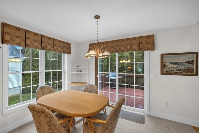 16 Spinnaker Dr Unit 16, East Lyme, CT 06357 - dining space featuring baseboards and a chandelier