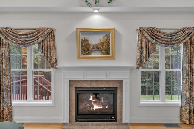 16 Spinnaker Dr Unit 16, East Lyme, CT 06357 - detailed view of a tile fireplace and wood finished floors