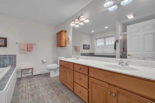 16 Spinnaker Dr Unit 16, East Lyme, CT 06357 - bathroom with double vanity, a stall shower, and a bath