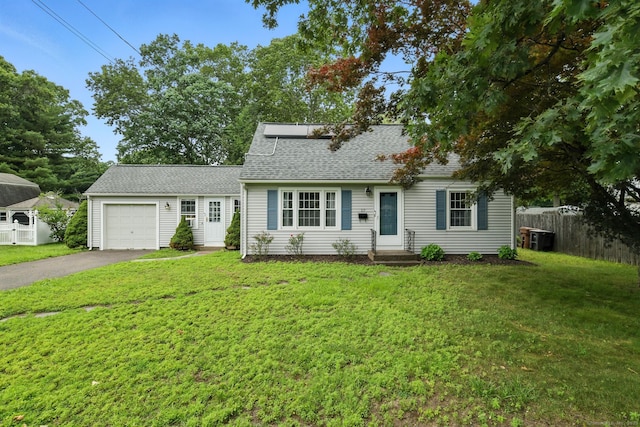 17 Wilstar Cir, Enfield, CT 06082 - view of front of home featuring an attached garage, asphalt driveway, and roof with shingles