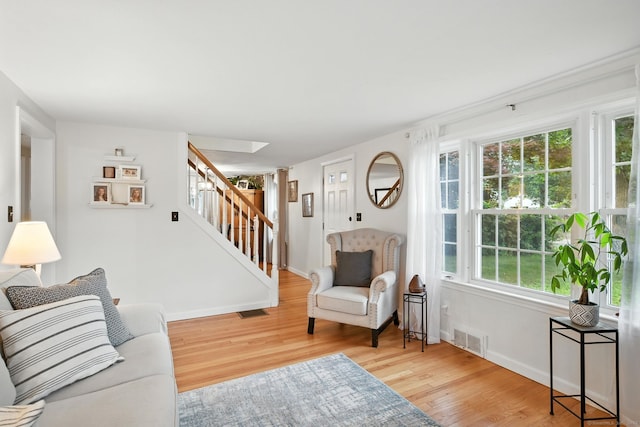 17 Wilstar Cir, Enfield, CT 06082 - living room with wood finished floors and stairway