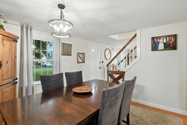 17 Wilstar Cir, Enfield, CT 06082 - dining room featuring a chandelier, stairway, and light wood-style flooring
