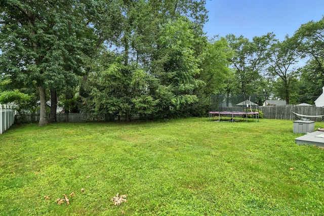 17 Wilstar Cir, Enfield, CT 06082 - fenced backyard with a trampoline