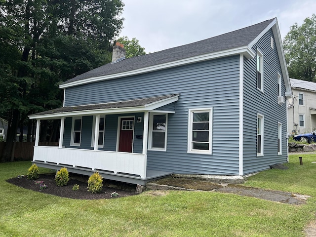 15 John St, Winchester, CT 06098 - view of front facade featuring covered porch, a front yard, a chimney, and roof with shingles