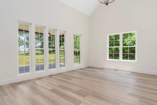 30 Tyrone Rd, Pomfret, CT 06259 - empty room featuring high vaulted ceiling and light wood-style floors