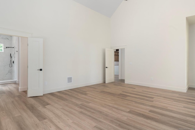 30 Tyrone Rd, Pomfret, CT 06259 - spare room with high vaulted ceiling and light wood-type flooring