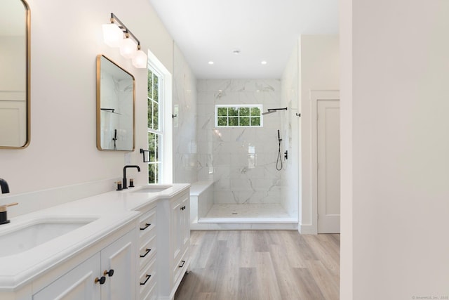 30 Tyrone Rd, Pomfret, CT 06259 - bathroom featuring a marble finish shower, double vanity, wood finished floors, and recessed lighting