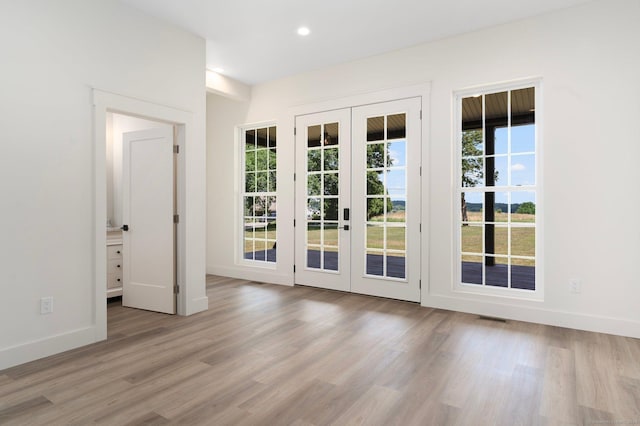 30 Tyrone Rd, Pomfret, CT 06259 - doorway with french doors, wood finished floors, and recessed lighting