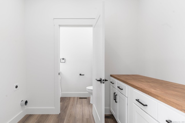 30 Tyrone Rd, Pomfret, CT 06259 - bathroom with toilet and wood finished floors