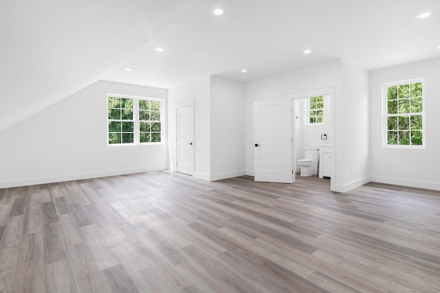 30 Tyrone Rd, Pomfret, CT 06259 - unfurnished living room featuring plenty of natural light, wood finished floors, recessed lighting, and lofted ceiling
