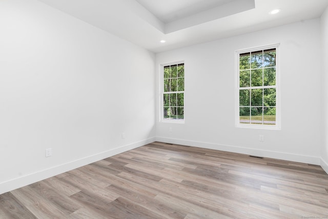 30 Tyrone Rd, Pomfret, CT 06259 - empty room featuring healthy amount of natural light, recessed lighting, light wood finished floors, and a raised ceiling