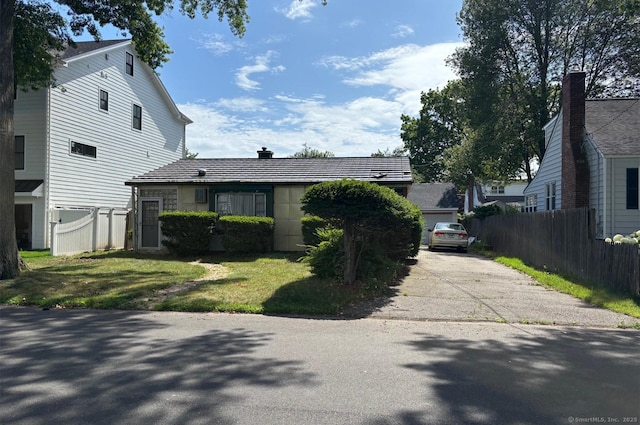 76 Pratt St, Fairfield, CT 06824 - view of front of home featuring a chimney