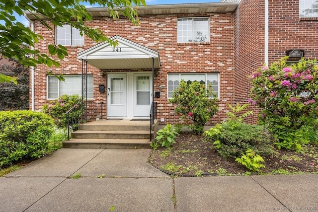 241 Judith Ln Unit 2, Waterbury, CT 06704 - view of exterior entry with brick siding
