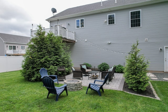 105 Hidden Pines Cir, Meriden, CT 06451 - view of green lawn featuring a fire pit, a patio, and a balcony