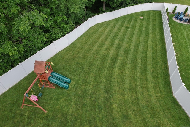 105 Hidden Pines Cir, Meriden, CT 06451 - view of property's community featuring a playground and a fenced backyard