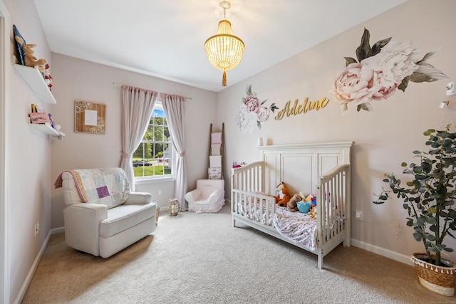 105 Hidden Pines Cir, Meriden, CT 06451 - bedroom featuring carpet floors, a chandelier, and a crib