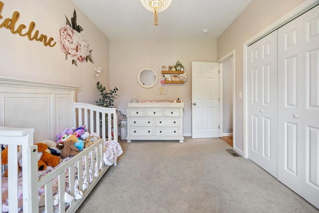 105 Hidden Pines Cir, Meriden, CT 06451 - bedroom featuring light carpet, a nursery area, and a closet