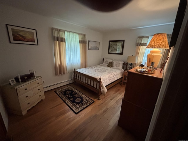 97 Flint Ridge Rd, Monroe, CT 06468 - bedroom featuring a baseboard heating unit and wood finished floors