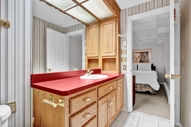189 Redstone Hill Rd Unit 7, Bristol, CT 06010 - bathroom with wallpapered walls, vanity, and tile patterned floors
