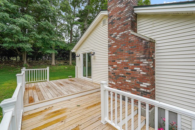 471 Moosup Pond Rd, Plainfield, CT 06354 - wooden deck featuring a yard