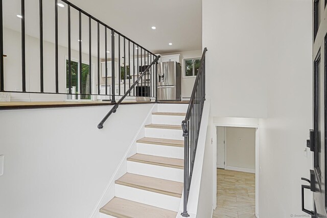 471 Moosup Pond Rd, Plainfield, CT 06354 - stairs featuring plenty of natural light, marble finish flooring, and recessed lighting