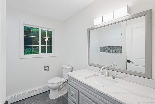 471 Moosup Pond Rd, Plainfield, CT 06354 - bathroom with a baseboard radiator and vanity