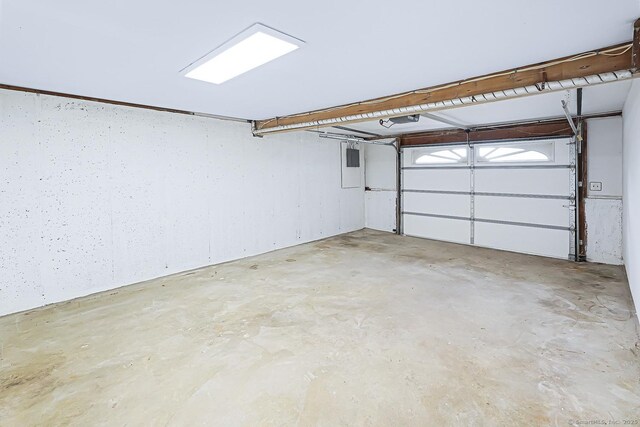 471 Moosup Pond Rd, Plainfield, CT 06354 - garage featuring electric panel and a garage door opener