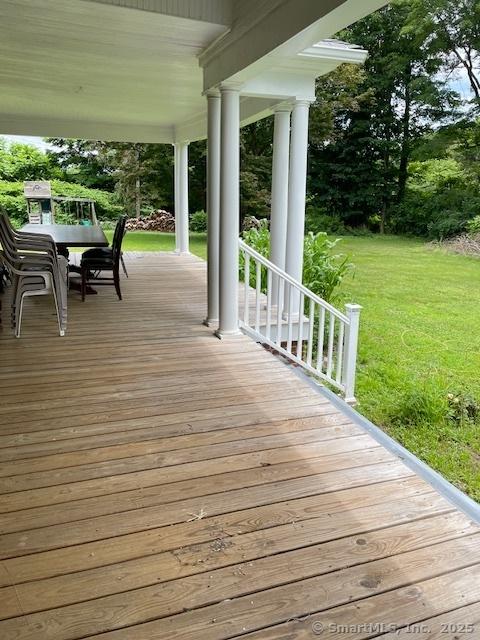 2 Judd Ave, Bethel, CT 06801 - wooden porch with a yard